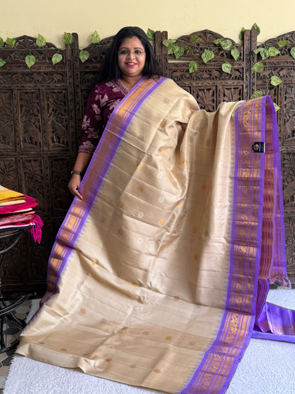 Gadwal Silk Saree Eggnog Colored Complemented With Gold Zari Border - Sampradaya Designer Studio