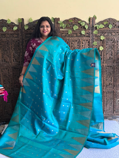 Gadwal Silk Saree Sea Breeze Colored Complemented With Gold And Silver Zari Border