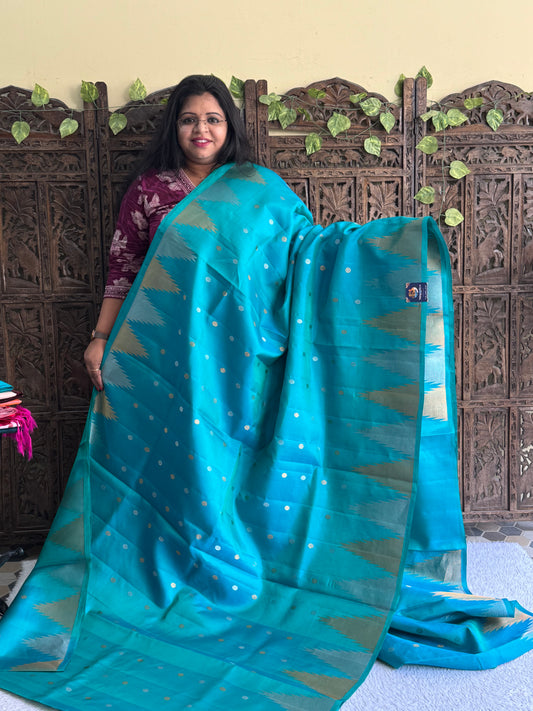 Gadwal Silk Saree Sea Breeze Colored Complemented With Gold And Silver Zari Border