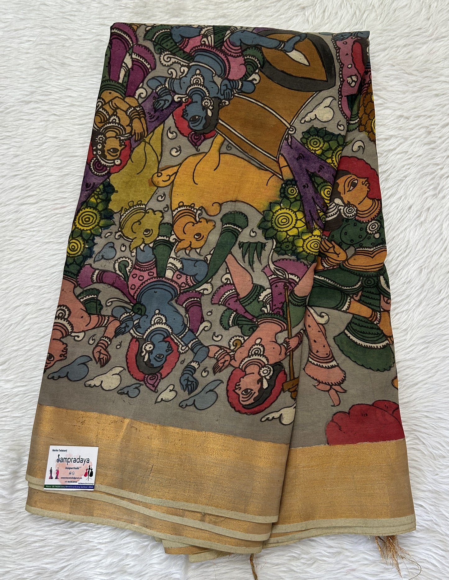 Pen Kalamkari Saree Gray colored allover saree complemented with a Gold Zari border - Sampradaya Designer Studio