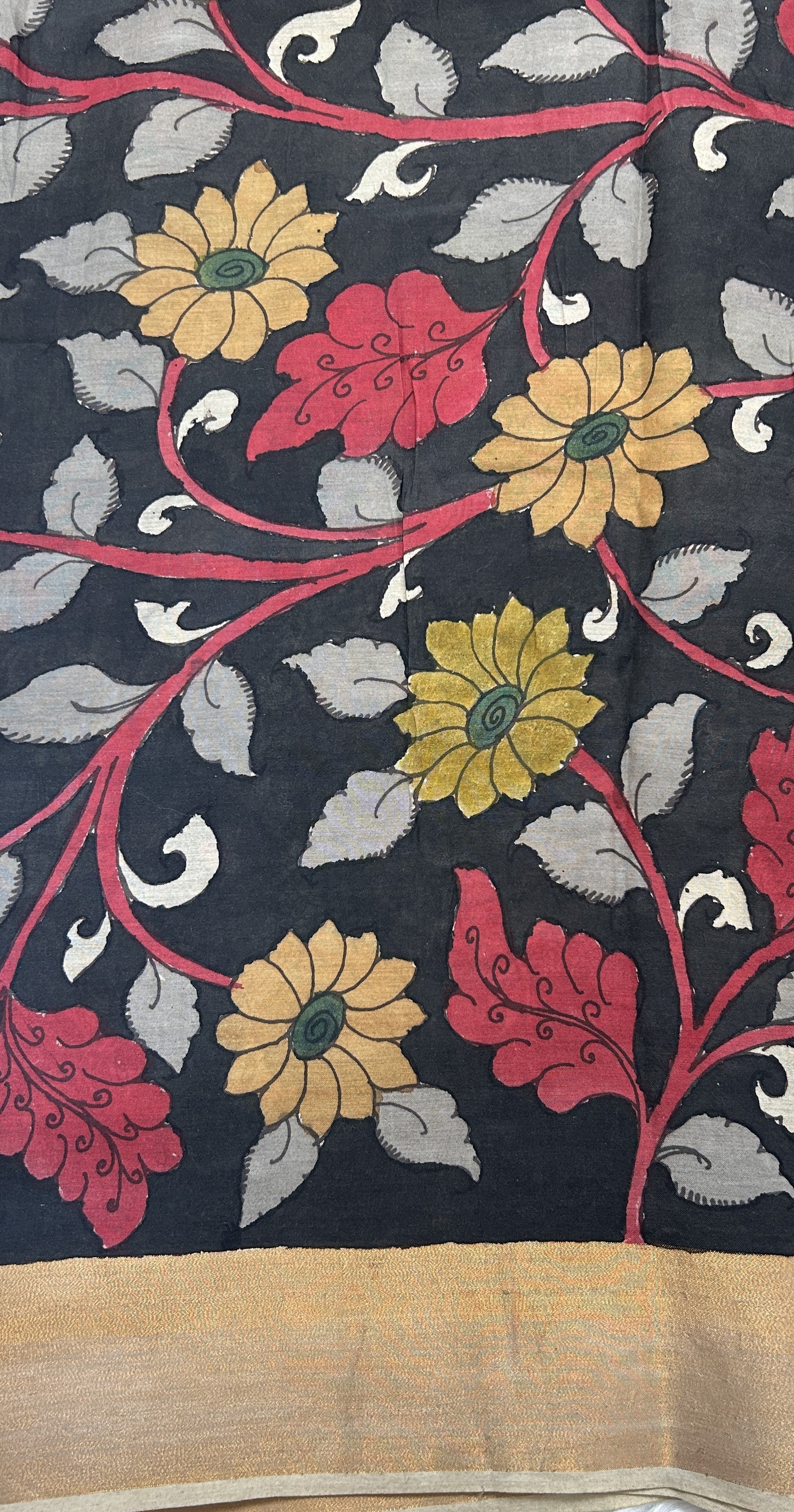 Pen Kalamkari Saree Gray colored allover saree complemented with a Gold Zari border - Sampradaya Designer Studio