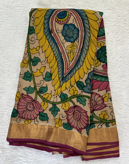 Pen Kalamkari Saree Maroon colored allover saree complemented with a Gold Zari border - Sampradaya Designer Studio