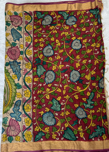 Pen Kalamkari Saree Maroon colored allover saree complemented with a Gold Zari border - Sampradaya Designer Studio