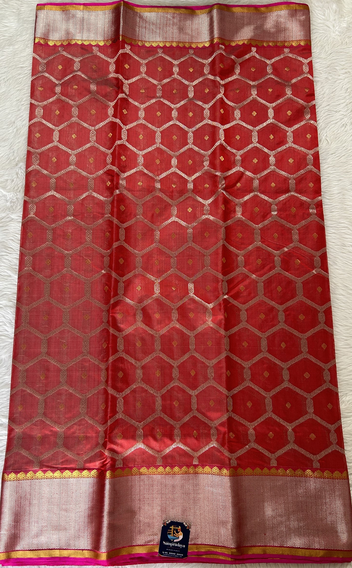 Chanderi Pattu Saree Red colored saree complemented with a Silver Zari border - Sampradaya Designer Studio