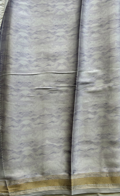 Satin Silk Saree Silver Colored Complemented with a Zari Border. - Sampradaya Designer Studio