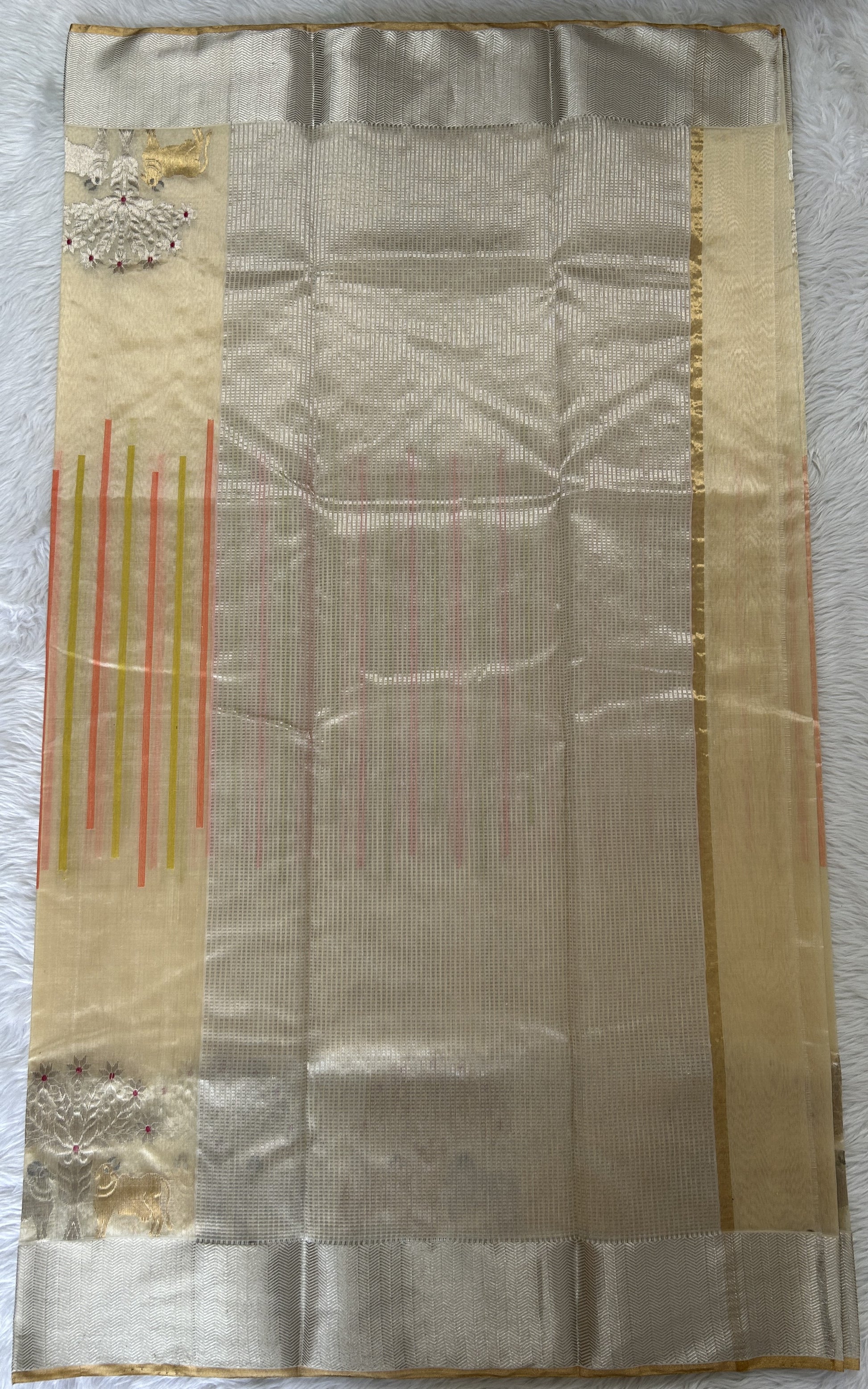 Chanderi Pattu Saree Cream colored saree complemented with a Silver Zari border - Sampradaya Designer Studio