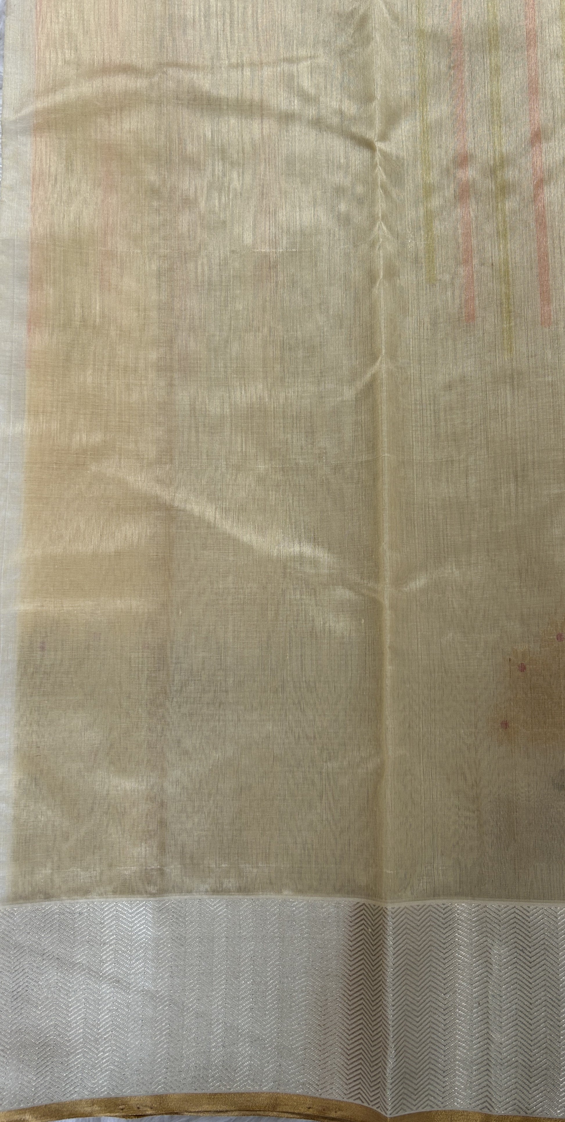 Chanderi Pattu Saree Cream colored saree complemented with a Silver Zari border - Sampradaya Designer Studio