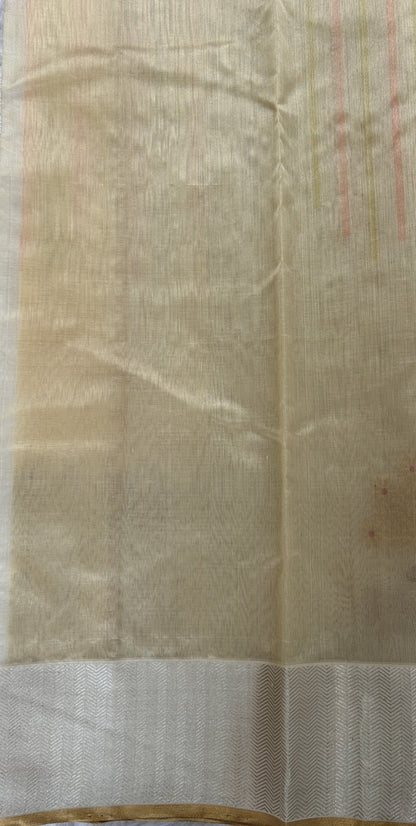 Chanderi Pattu Saree Cream colored saree complemented with a Silver Zari border - Sampradaya Designer Studio