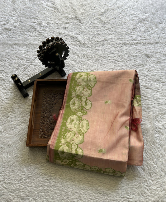 Semi Tussar Saree Peach Colored complemented with a Embosed Border. - Sampradaya Designer Studio