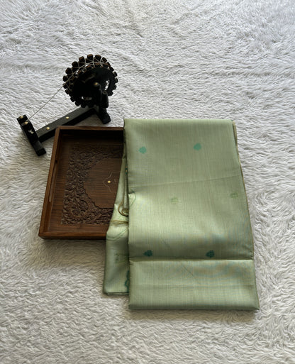 Semi Tussar Saree Fern Colored complemented with a Embosed Border. - Sampradaya Designer Studio