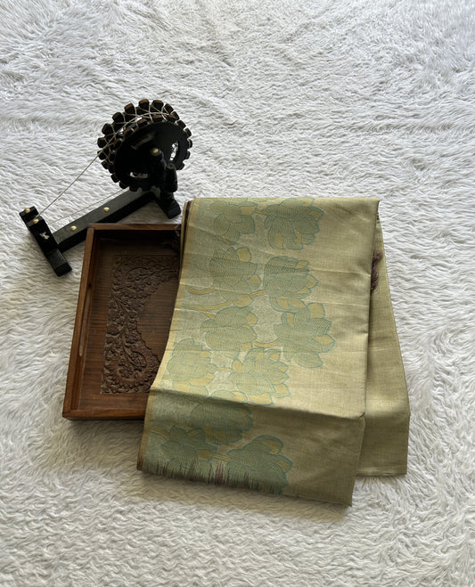 Semi Tussar Saree Olive Green Colored complemented with a Embosed Border. - Sampradaya Designer Studio