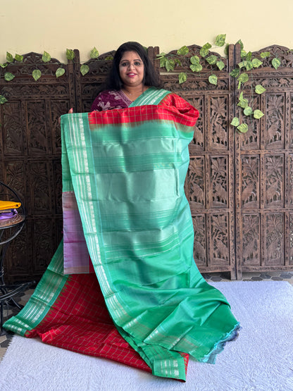 Gadwal Silk Saree Crimson Red Colored Complemented With Silver Zari Border