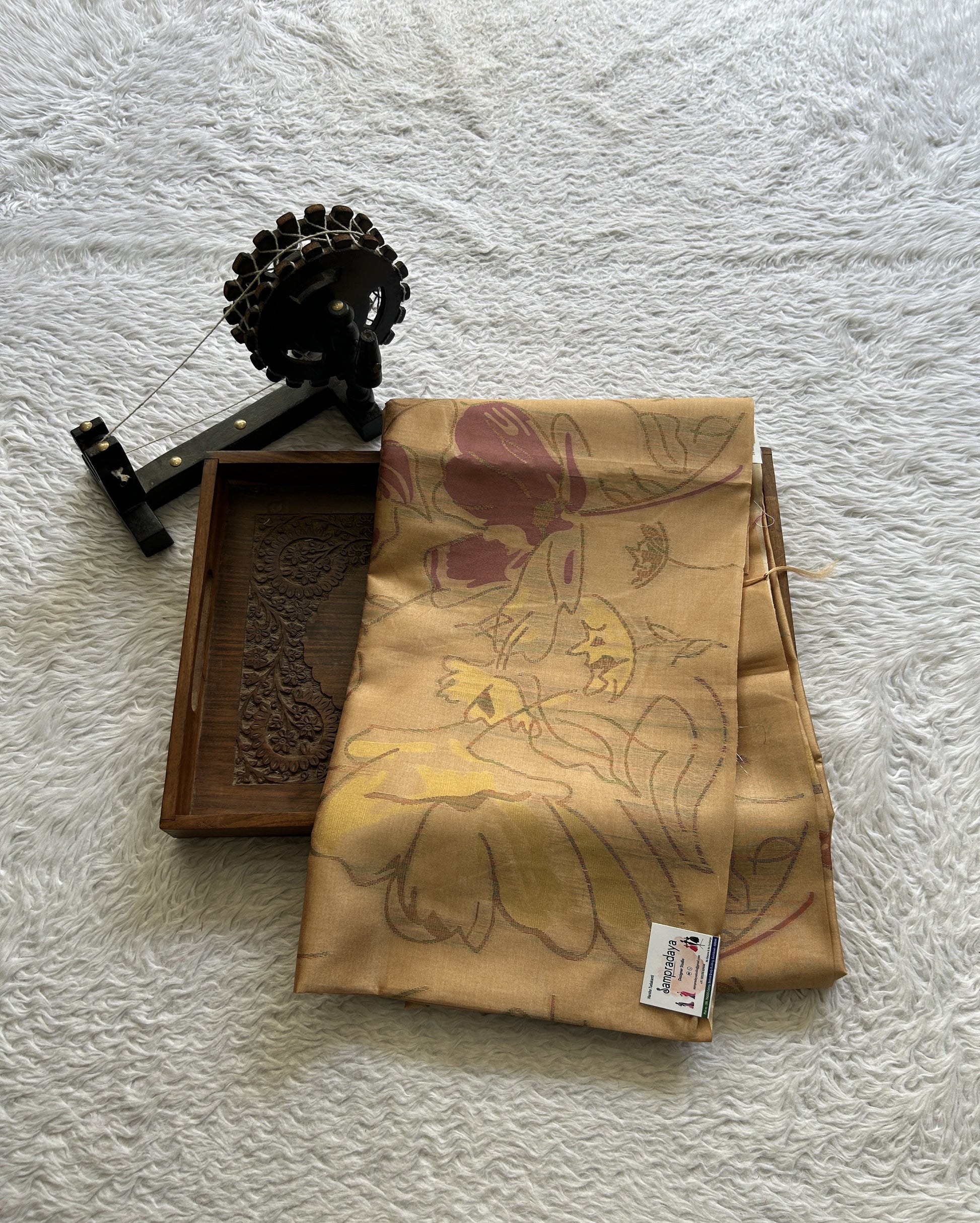 Semi Tussar Saree Mustard Colored complemented with a Embosed Border. - Sampradaya Designer Studio