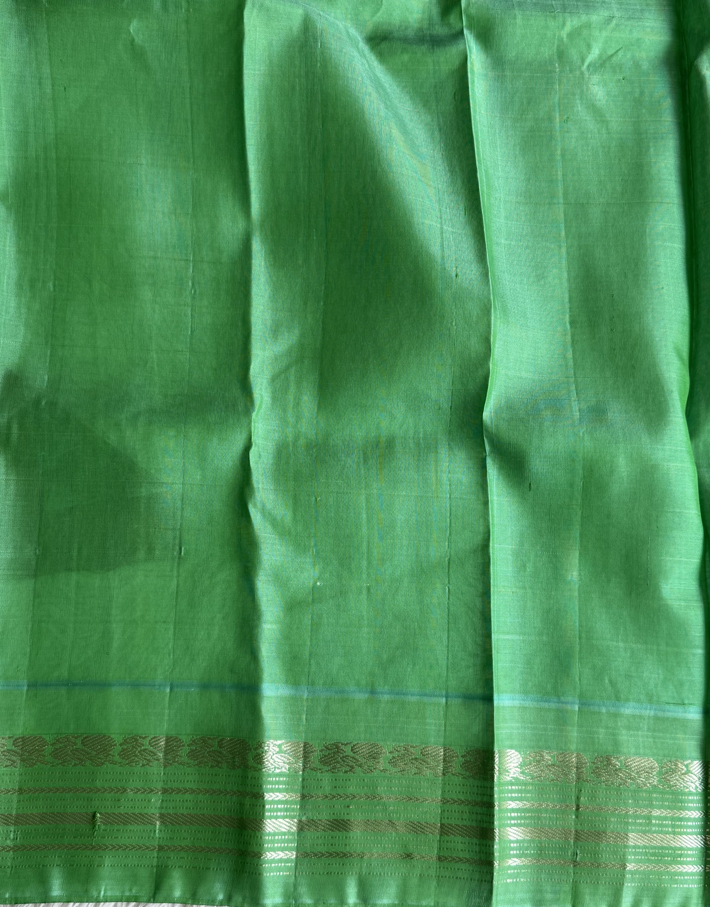 Gadwal Silk Saree Crimson Red Colored Complemented With Silver Zari Border