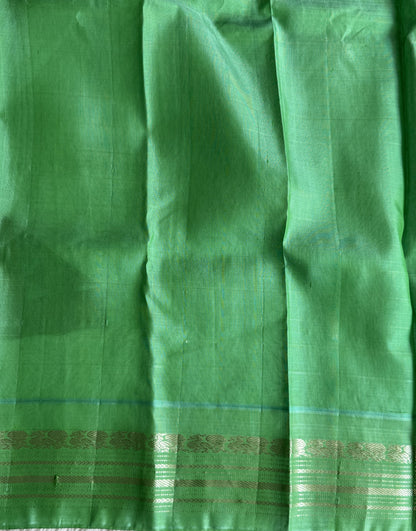 Gadwal Silk Saree Crimson Red Colored Complemented With Silver Zari Border