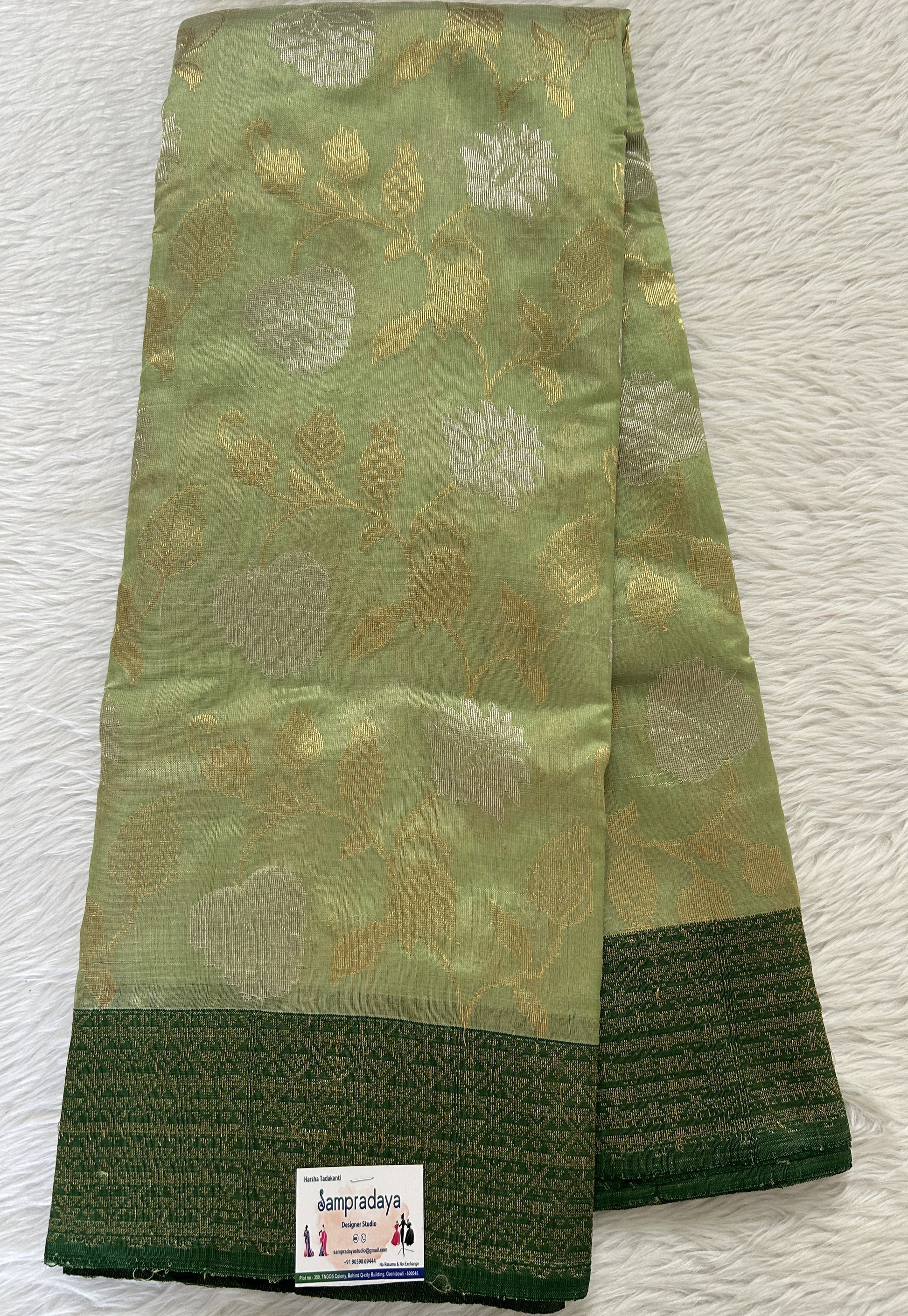Chanderi Pattu Saree Pastel Green colored saree complemented with a Bottle Green Gold Zari border - Sampradaya Designer Studio