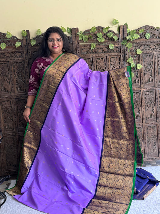 Gadwal Silk Saree Cornflower Colored Complemented With Gold And Silver Zari Border