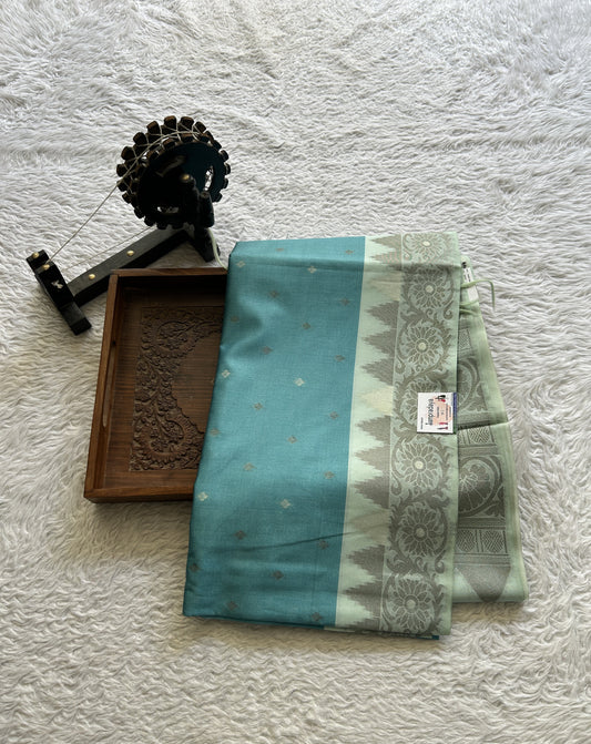 Semi Tussar Saree Blue Colored complemented with a Zari Border. - Sampradaya Designer Studio