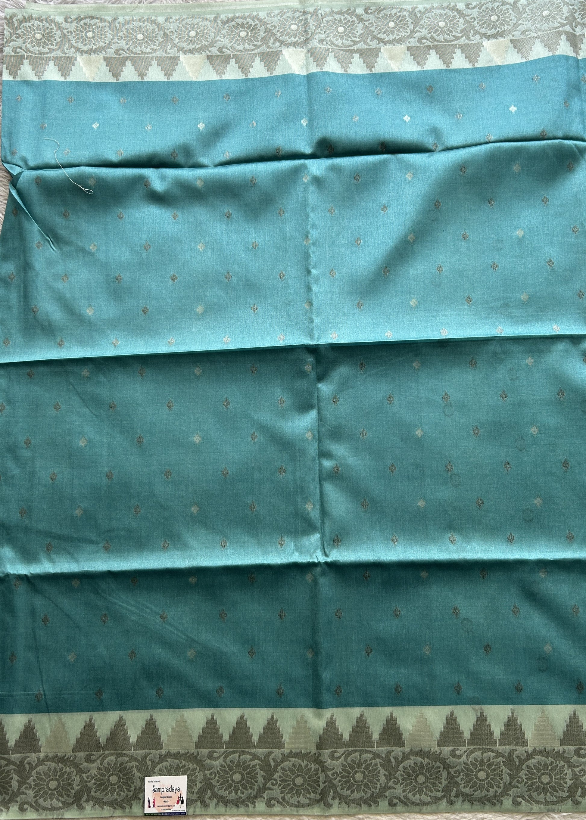 Semi Tussar Saree Blue Colored complemented with a Zari Border. - Sampradaya Designer Studio