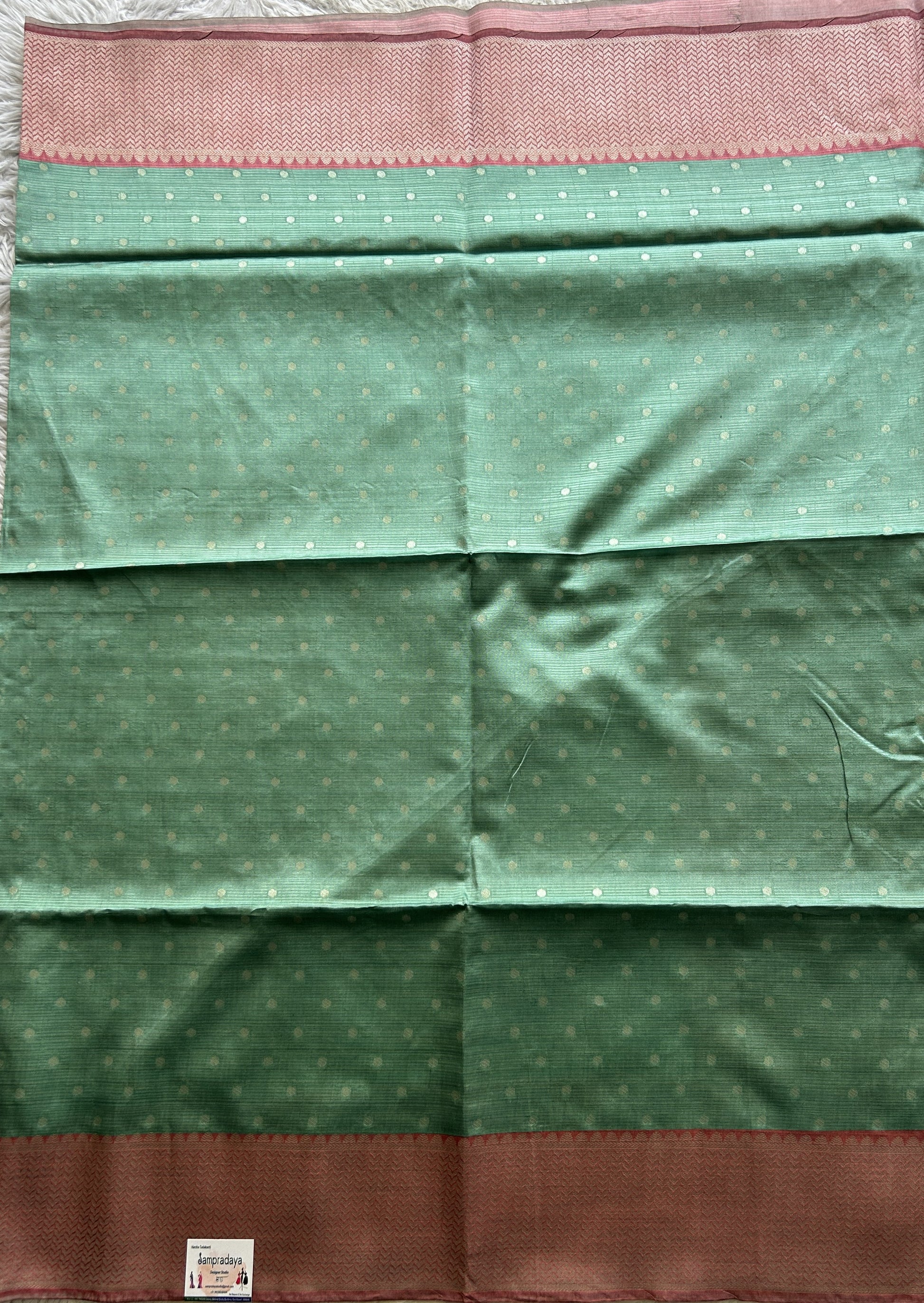Semi Tussar Saree Green Colored complemented with a Zari Border. - Sampradaya Designer Studio