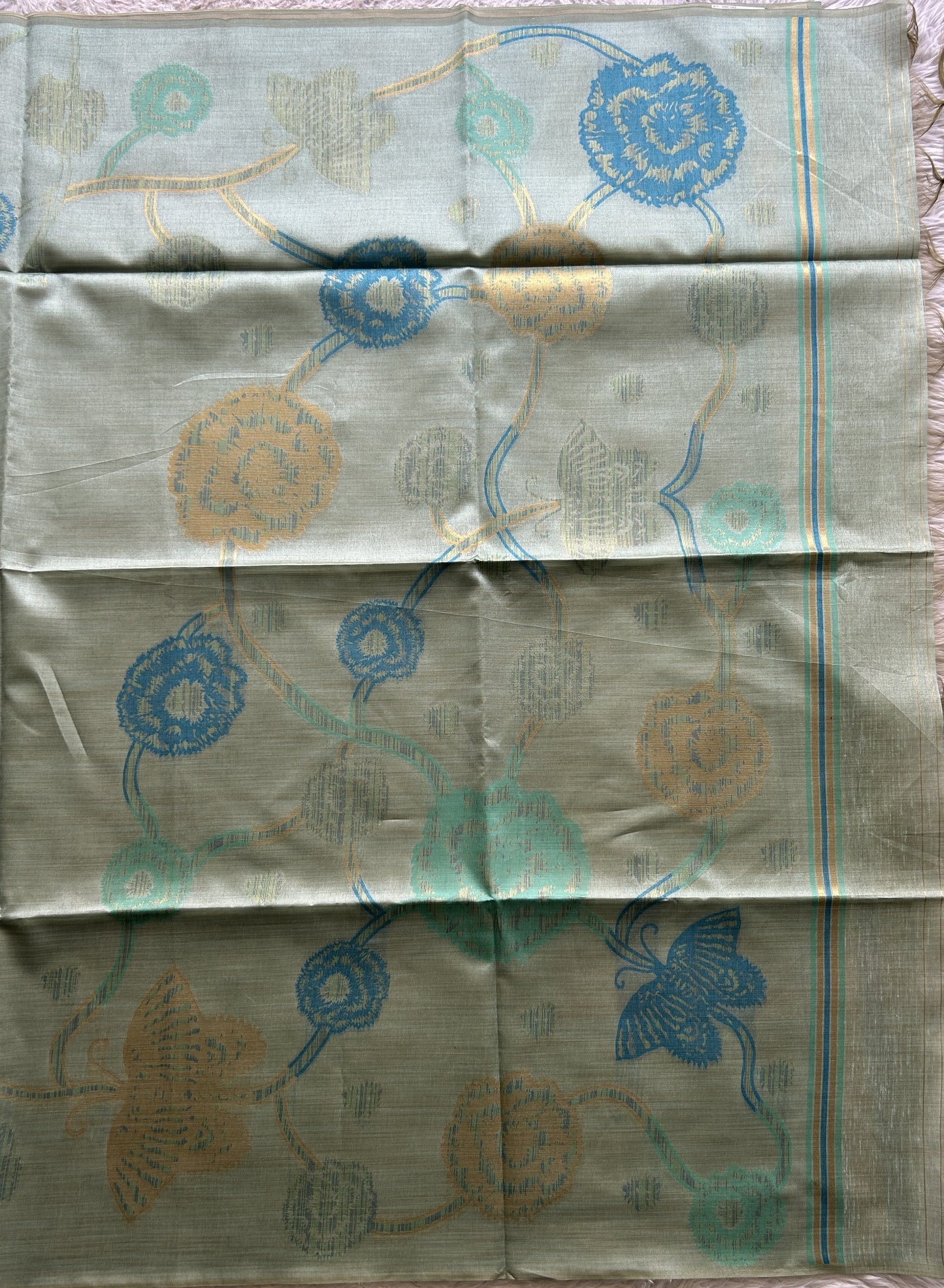 Semi Tussar Saree Sea Blue Colored complemented with a Embosed Border. - Sampradaya Designer Studio