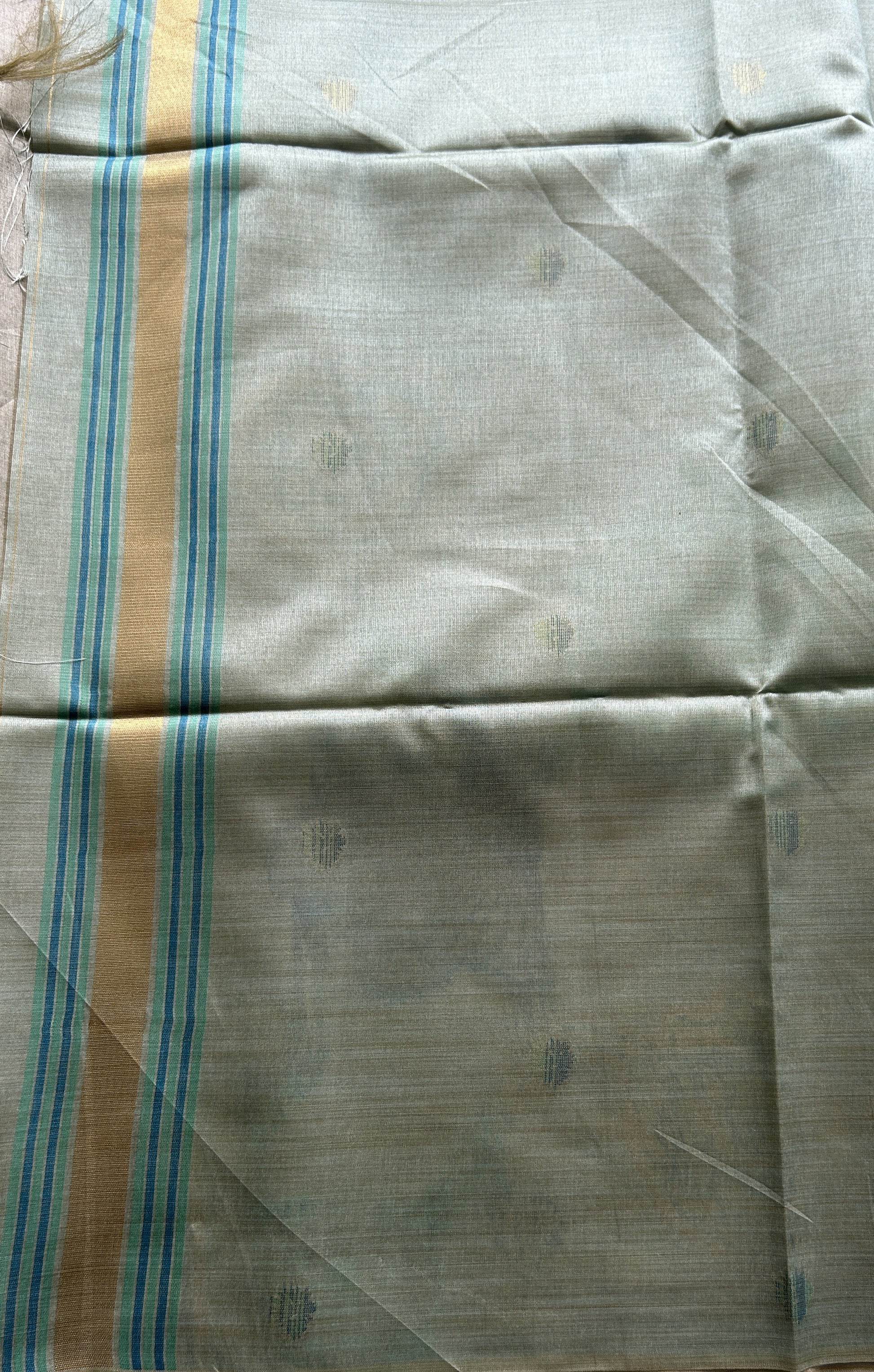 Semi Tussar Saree Sea Blue Colored complemented with a Embosed Border. - Sampradaya Designer Studio