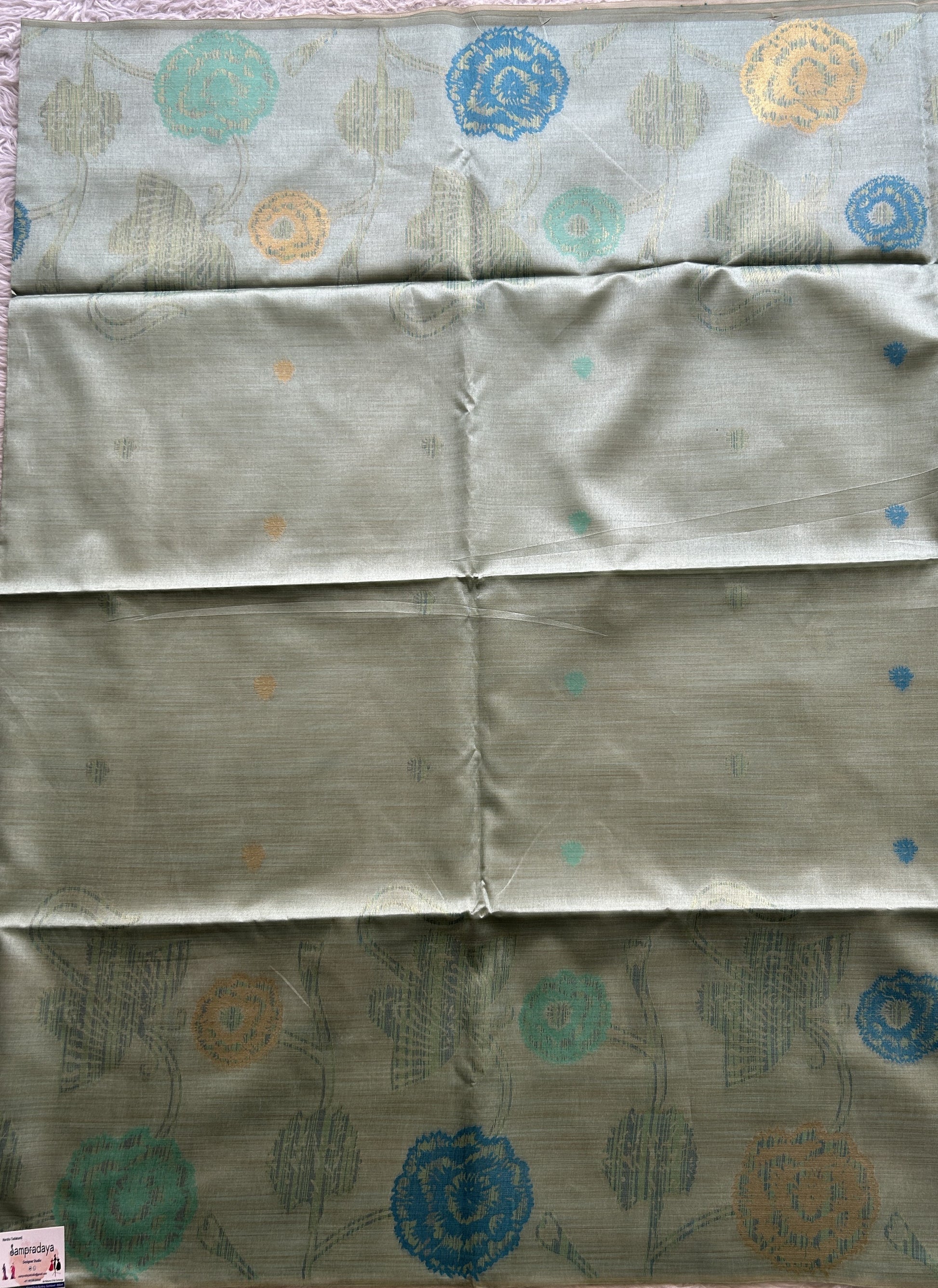 Semi Tussar Saree Sea Blue Colored complemented with a Embosed Border. - Sampradaya Designer Studio