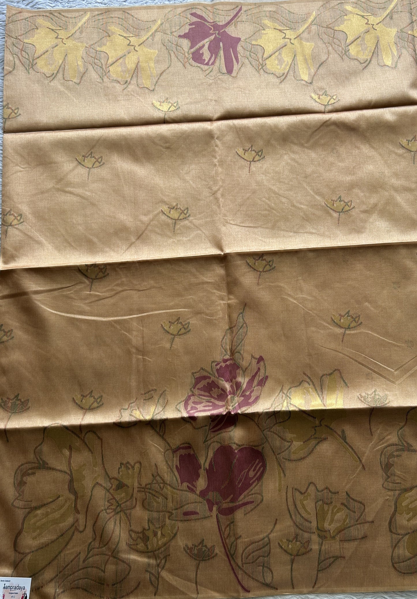 Semi Tussar Saree Mustard Colored complemented with a Embosed Border. - Sampradaya Designer Studio