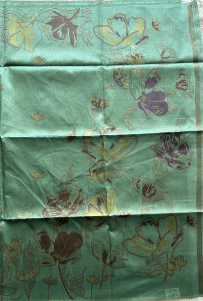 Semi Tussar Saree Ocean Green Colored complemented with a Embosed Border. - Sampradaya Designer Studio