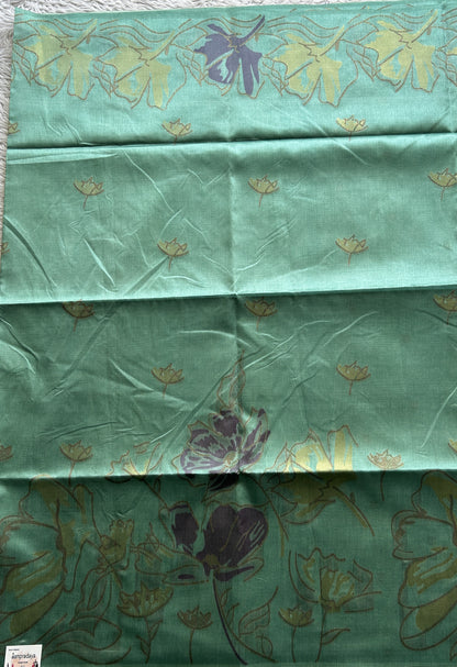 Semi Tussar Saree Ocean Green Colored complemented with a Embosed Border. - Sampradaya Designer Studio