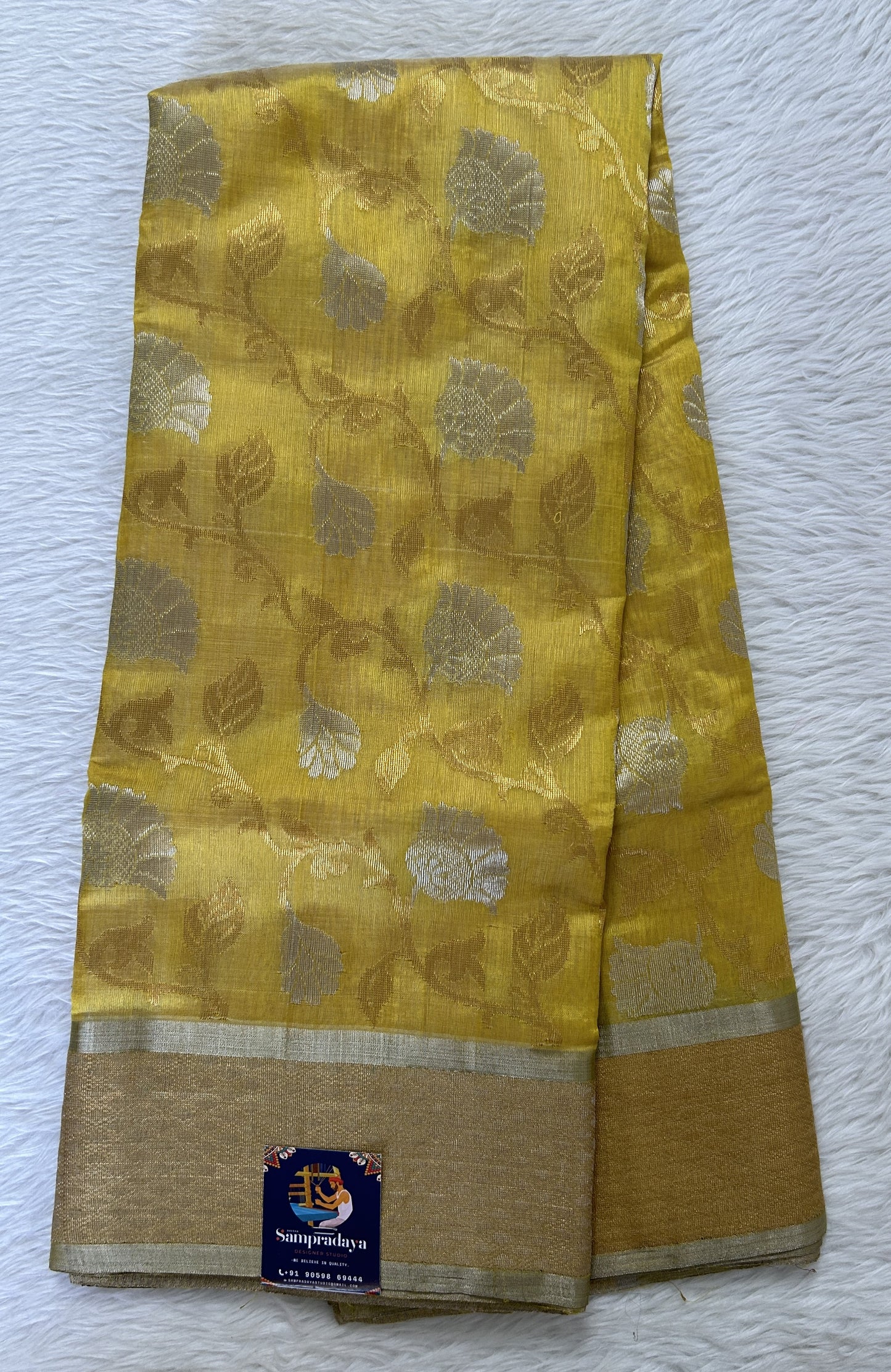 Chanderi Pattu Saree Yellow colored saree complemented with a Gold Zari border - Sampradaya Designer Studio