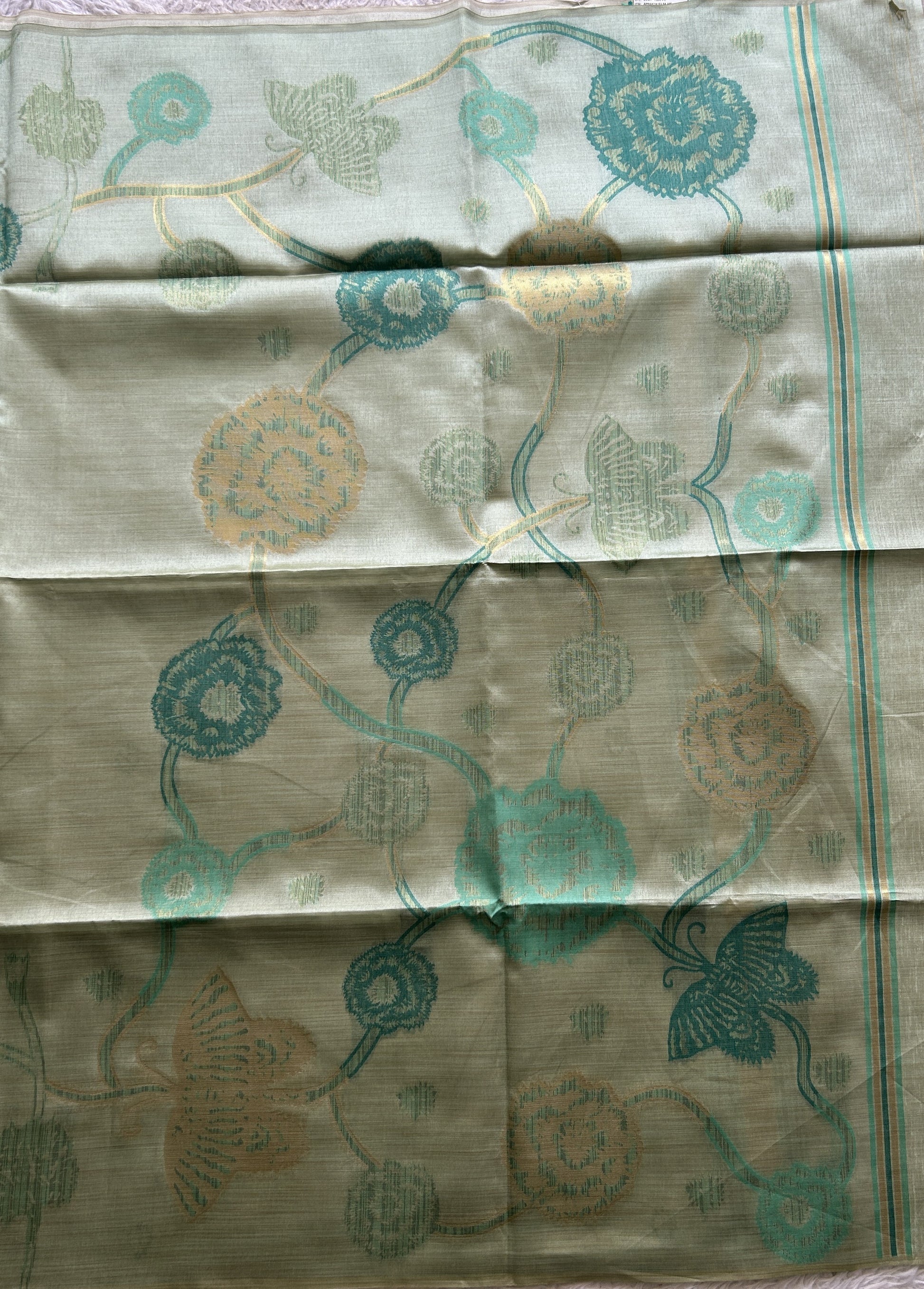 Semi Tussar Saree Fern Colored complemented with a Embosed Border. - Sampradaya Designer Studio