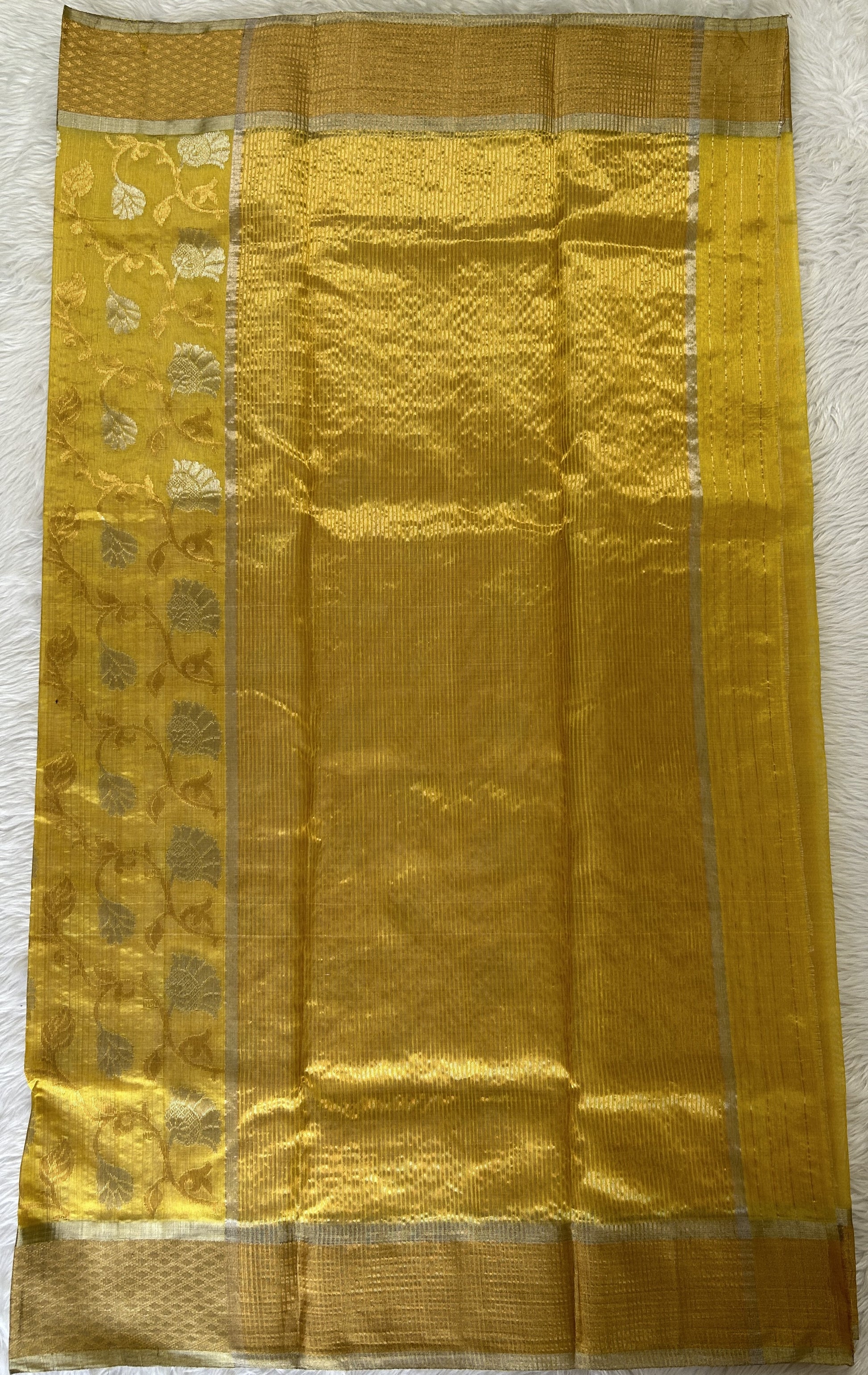 Chanderi Pattu Saree Yellow colored saree complemented with a Gold Zari border - Sampradaya Designer Studio