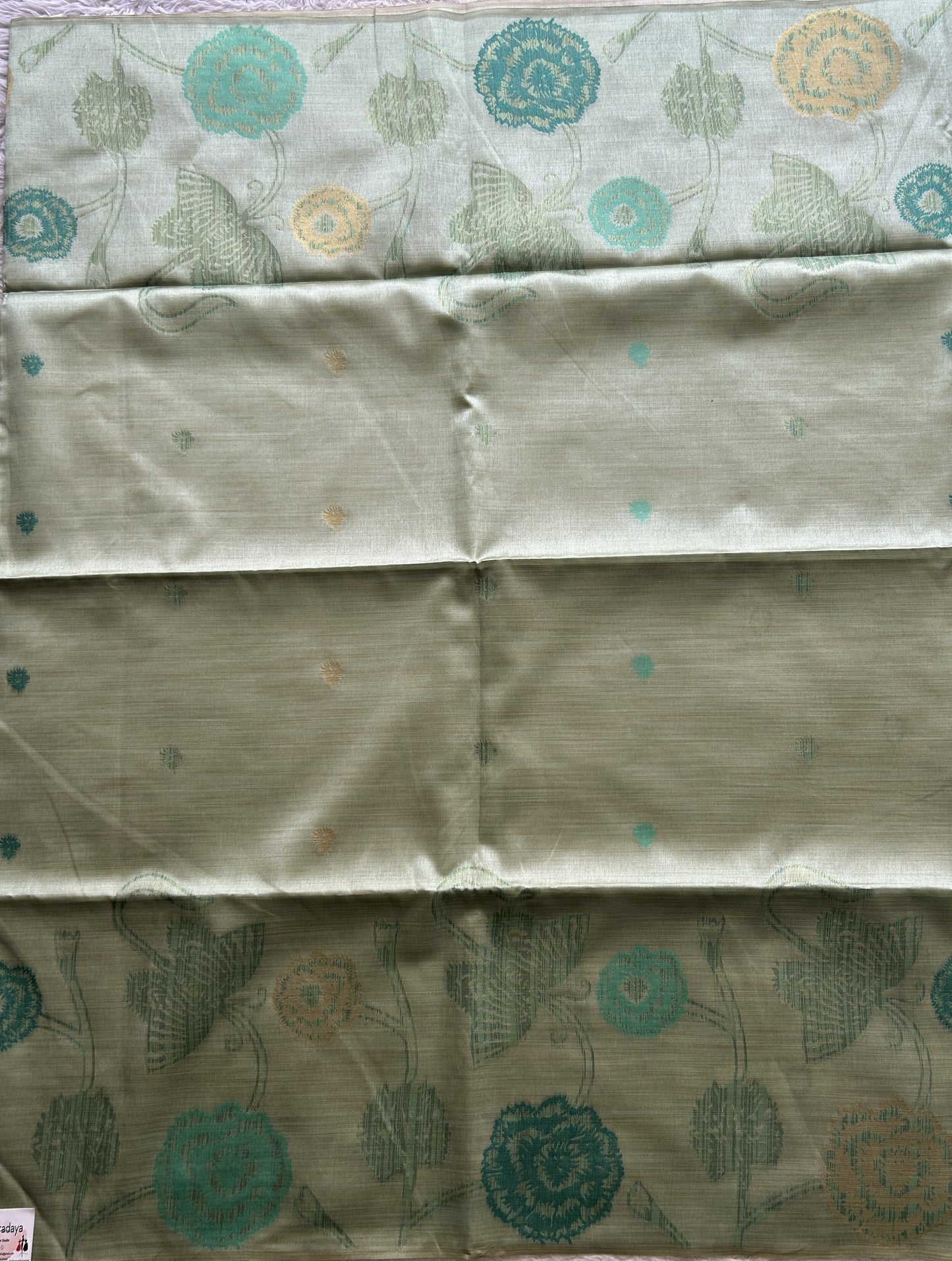 Semi Tussar Saree Fern Colored complemented with a Embosed Border. - Sampradaya Designer Studio