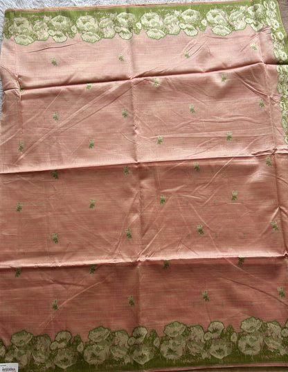 Semi Tussar Saree Peach Colored complemented with a Embosed Border. - Sampradaya Designer Studio