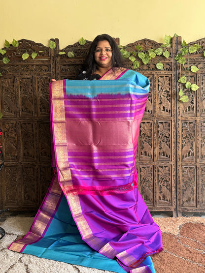 Pure Kanjivaram Silk Saree Olympic Colored Elegantly Paid with a Gold Zari Border.