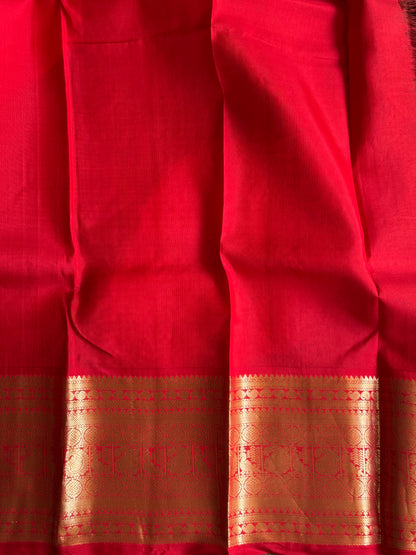 Pure Kanjivaram Silk Saree Ocean Blue Colored Elegantly Paid with a Gold Zari Border.