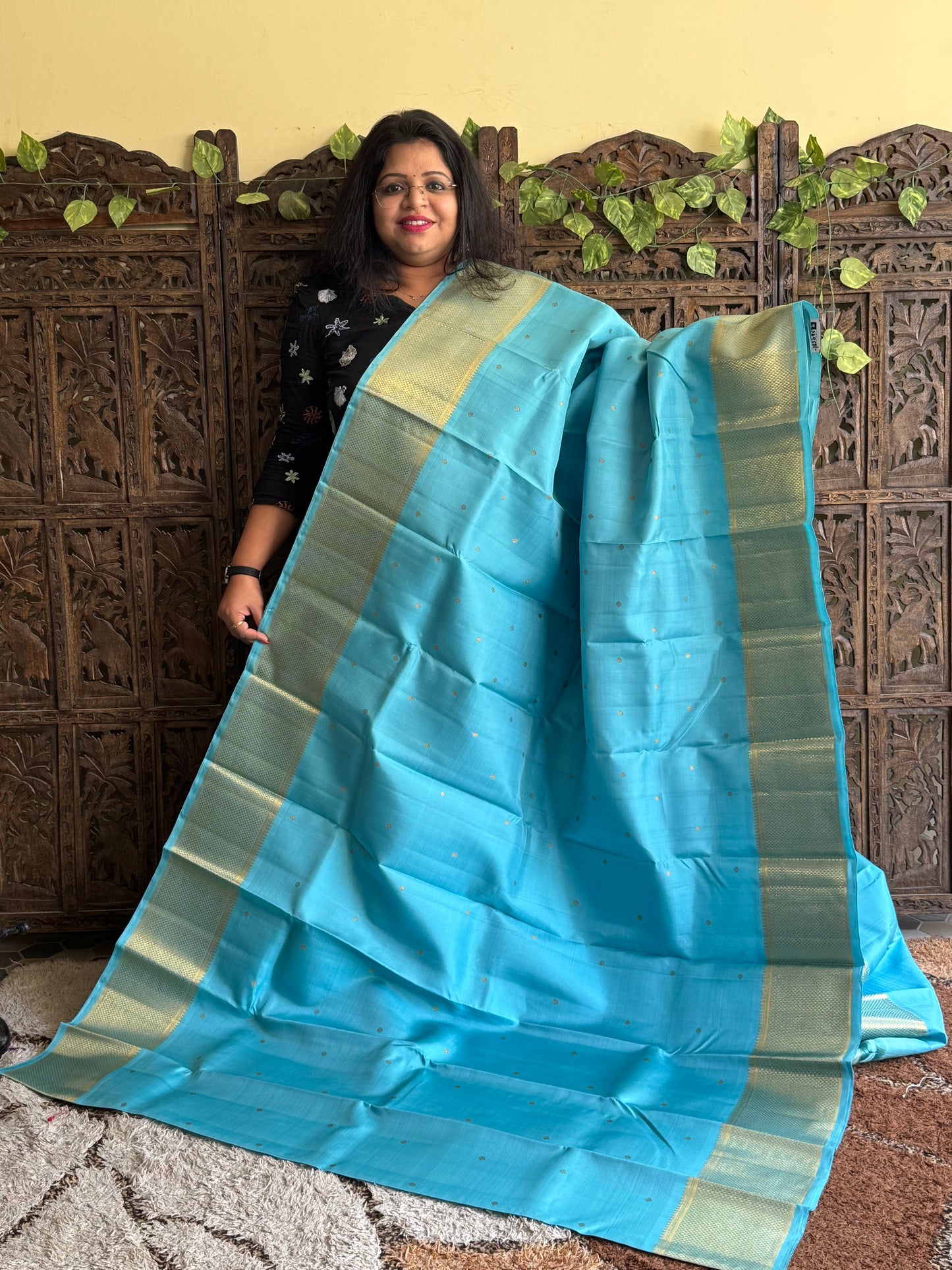 Pure Kanjivaram Silk Saree Sky Blue Colored Elegantly Paid with a Gold Zari Border.