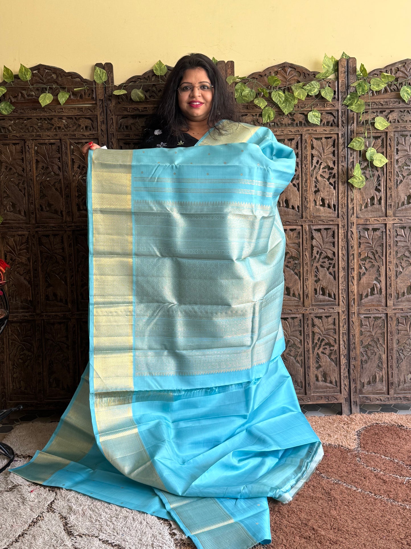Pure Kanjivaram Silk Saree Sky Blue Colored Elegantly Paid with a Gold Zari Border.