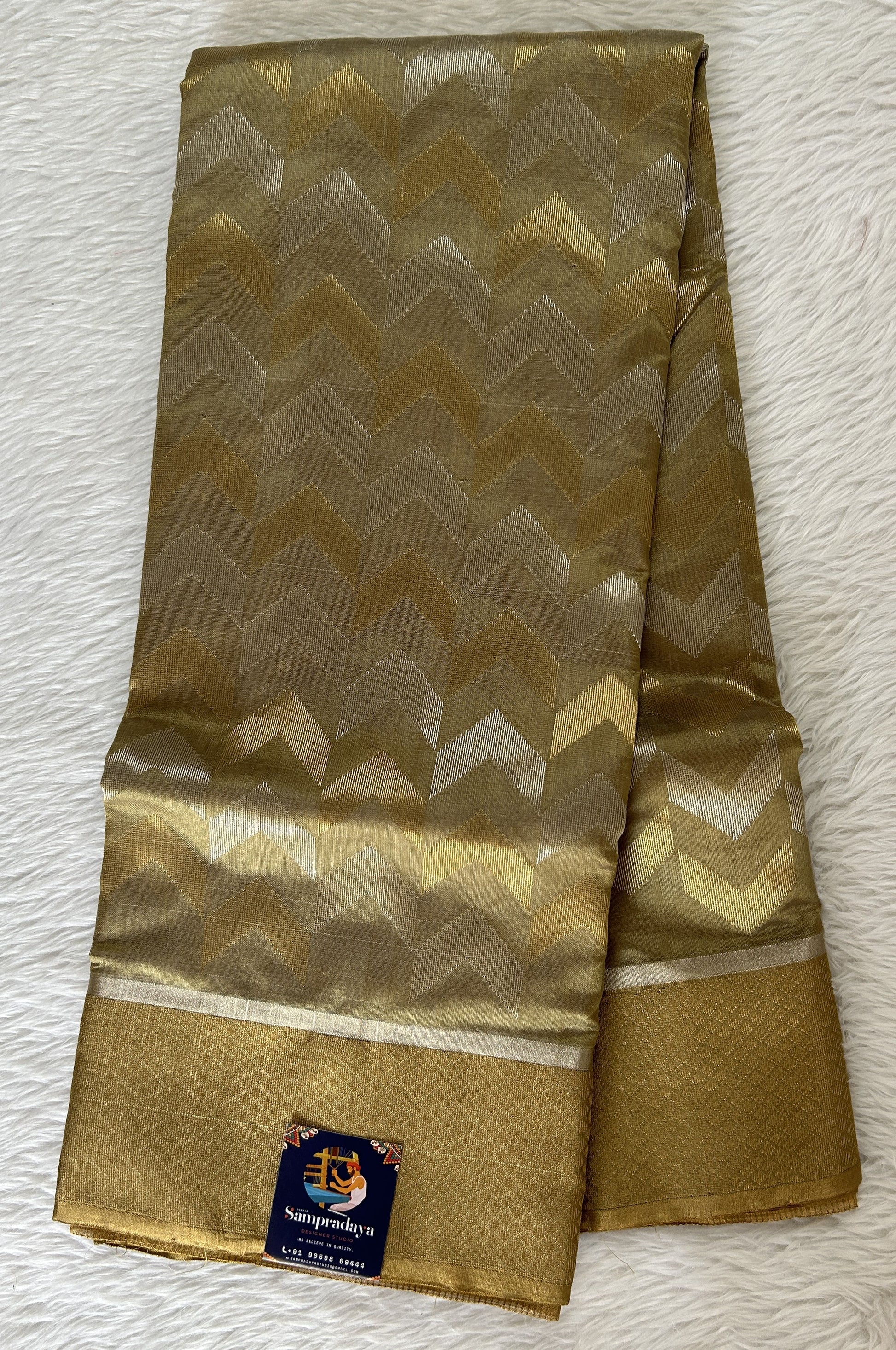 Chanderi Pattu Saree Pastel Green colored saree complemented with a Gold Zari border - Sampradaya Designer Studio