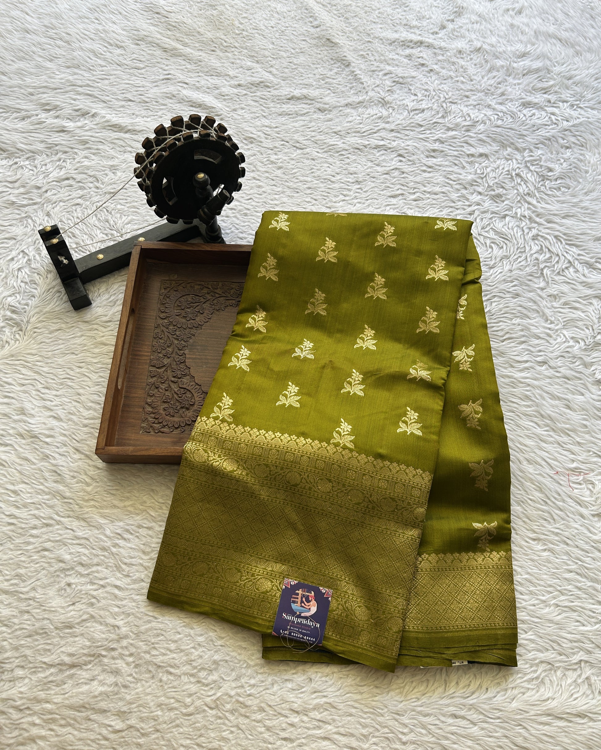 Chiniya Silk Saree Olive Green Colored Exquisite with a Zari Border. - Sampradaya Designer Studio