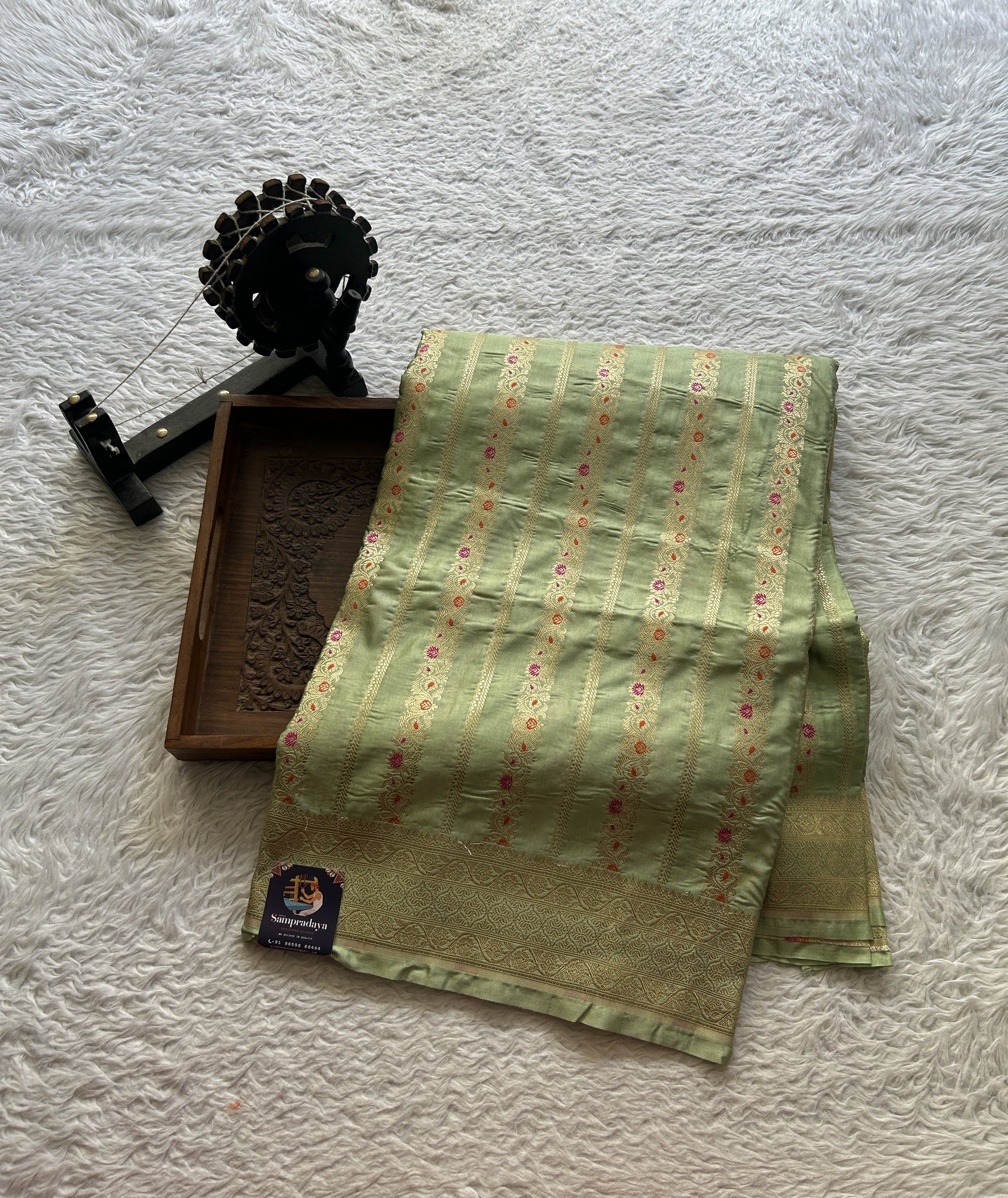 Chiniya Silk Saree Light Green Colored Elegantly Paired with a Zari Border. - Sampradaya Designer Studio