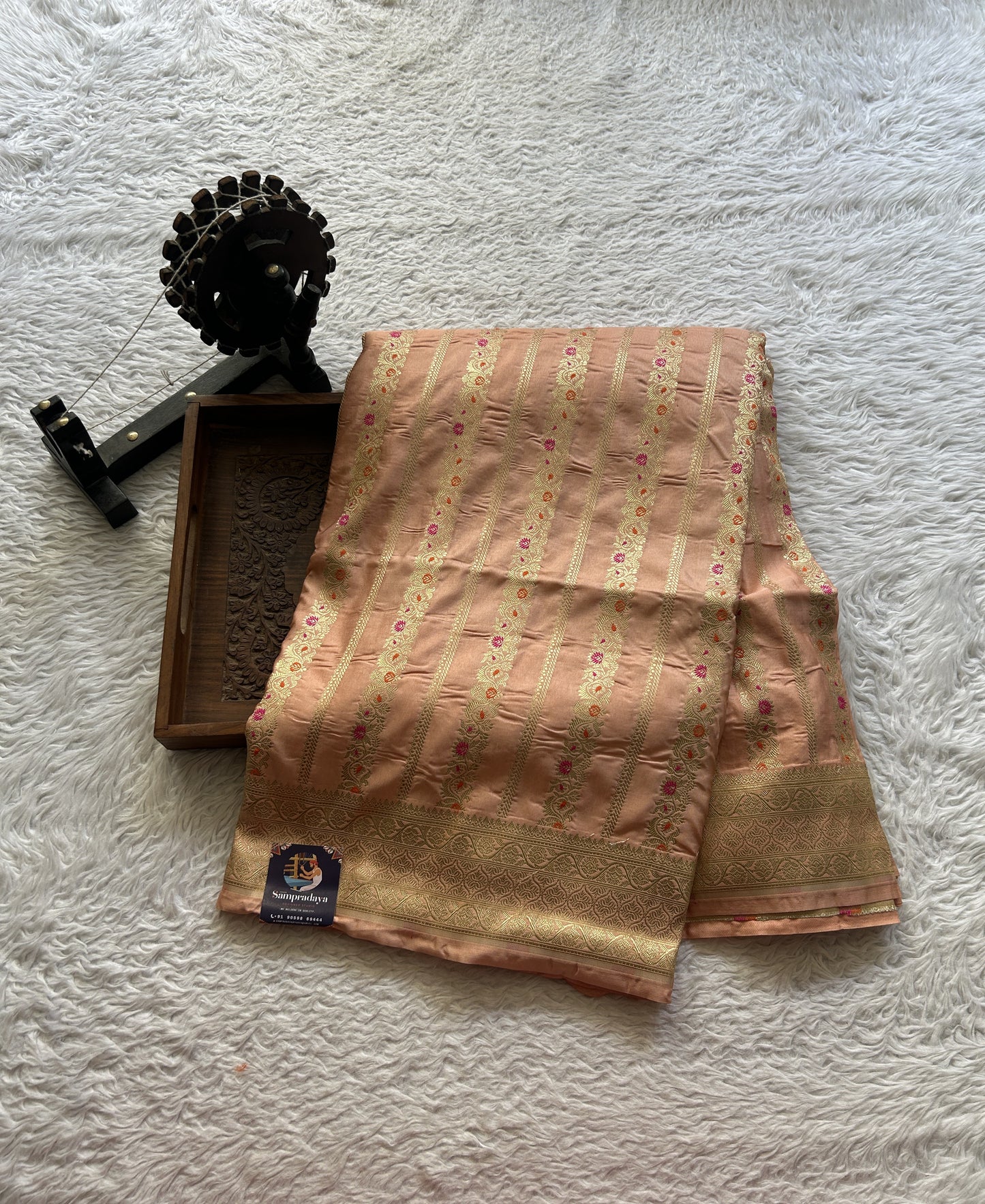 Chiniya Silk Saree Light Peach Colored Elegantly Paired with a Zari Border. - Sampradaya Designer Studio