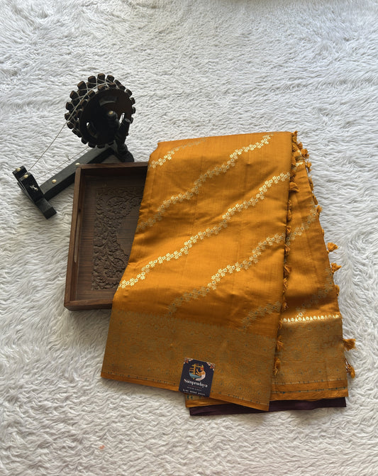 Chiniya Silk Saree Orange Colored Elegantly Paired with a Zari Border. - Sampradaya Designer Studio