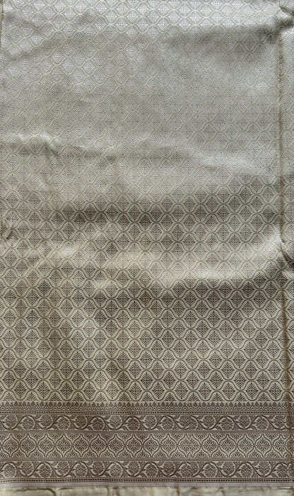 Chiniya Silk Saree Very Light yellow Colored Elegantly Paired with a Zari Border. - Sampradaya Designer Studio