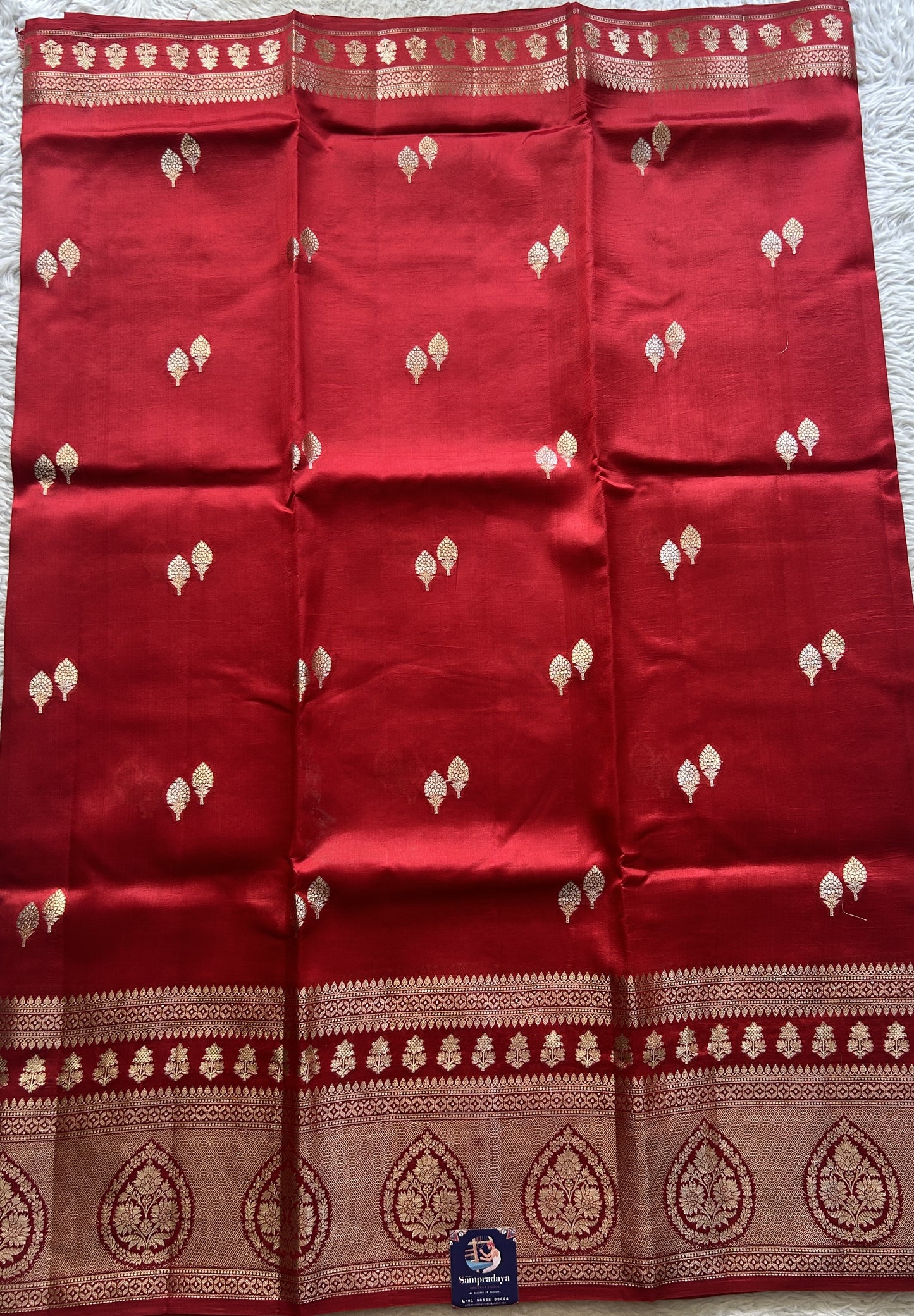Chiniya Silk Saree Red Colored Elegantly Paired with a Zari Border. - Sampradaya Designer Studio