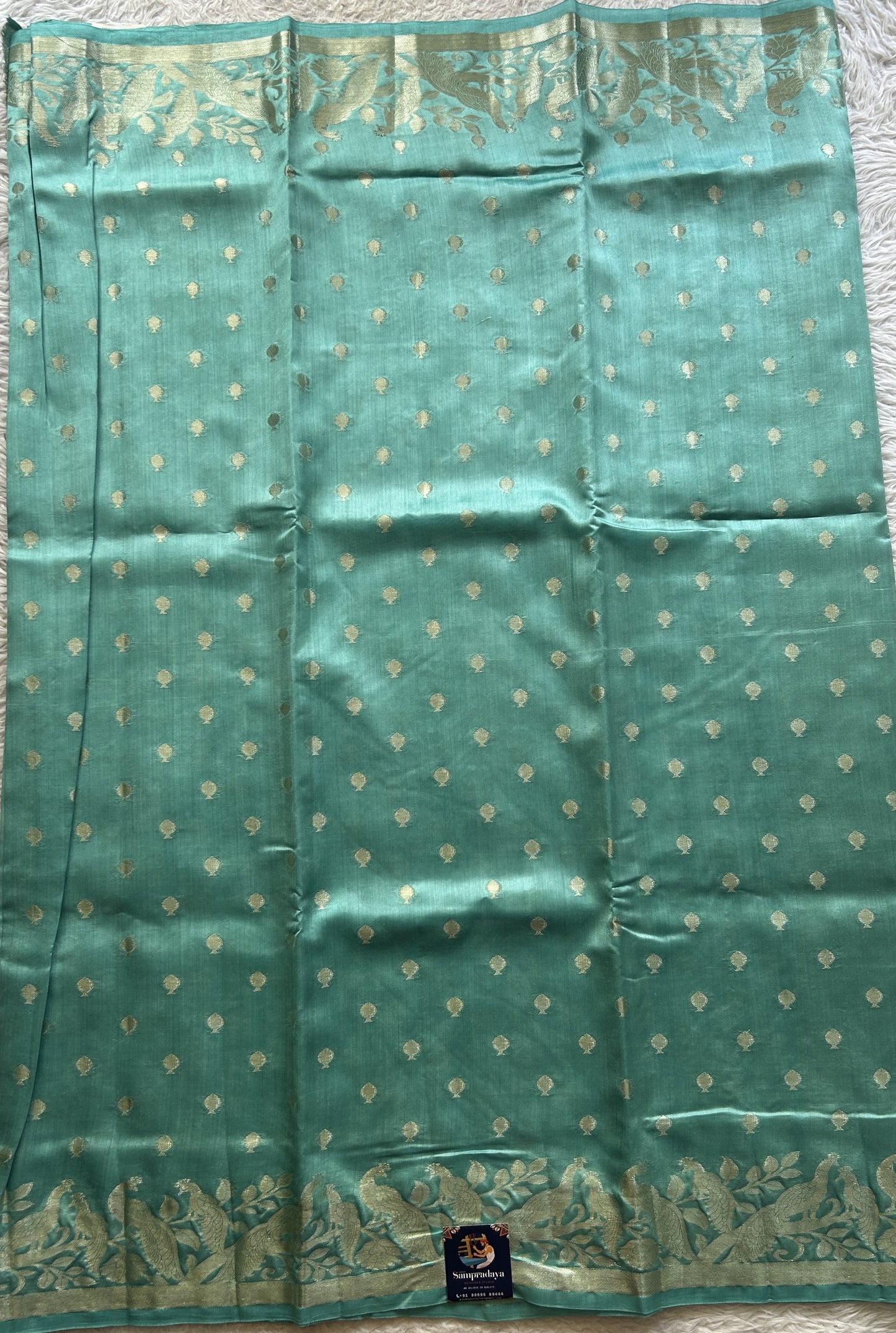 Chiniya Silk Saree Light Blue Colored Elegantly Paired with a Zari Border. - Sampradaya Designer Studio