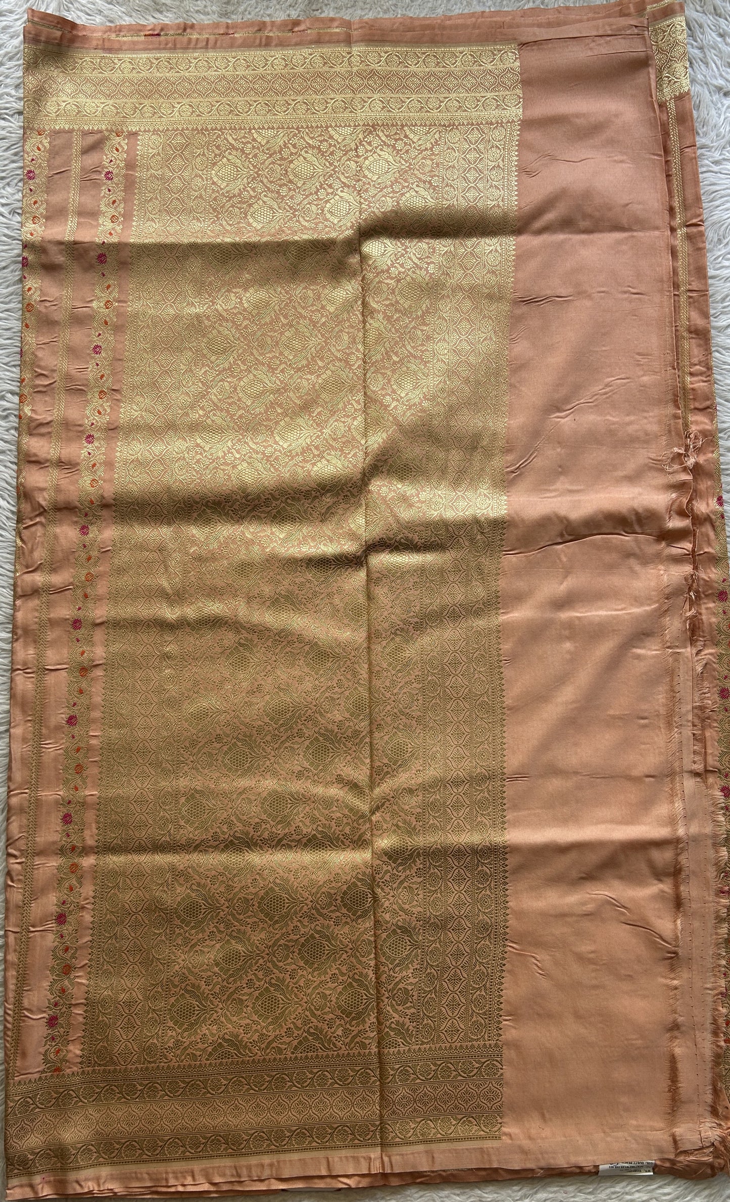 Chiniya Silk Saree Light Peach Colored Elegantly Paired with a Zari Border. - Sampradaya Designer Studio