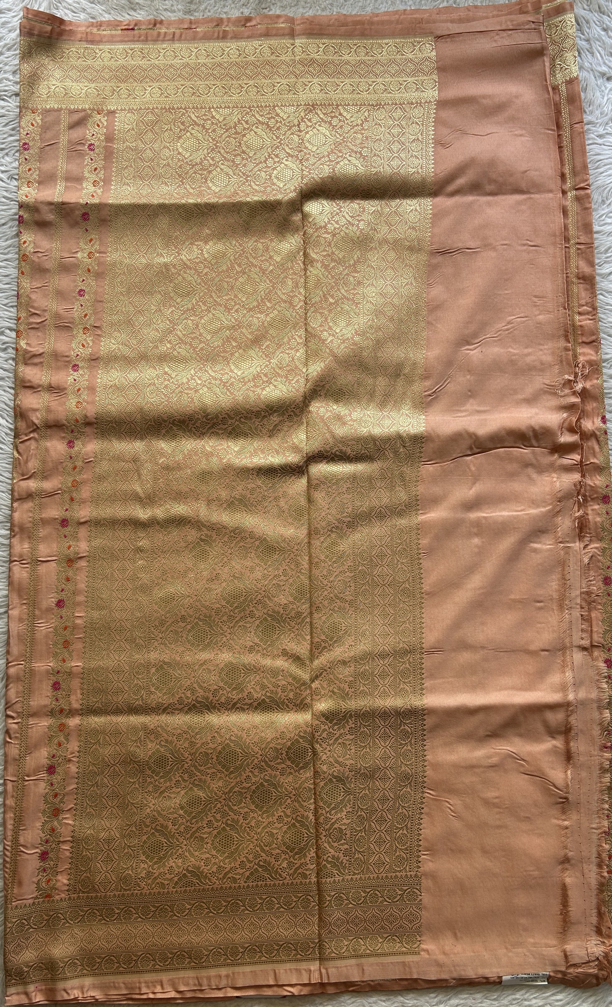 Chiniya Silk Saree Light Peach Colored Elegantly Paired with a Zari Border. - Sampradaya Designer Studio