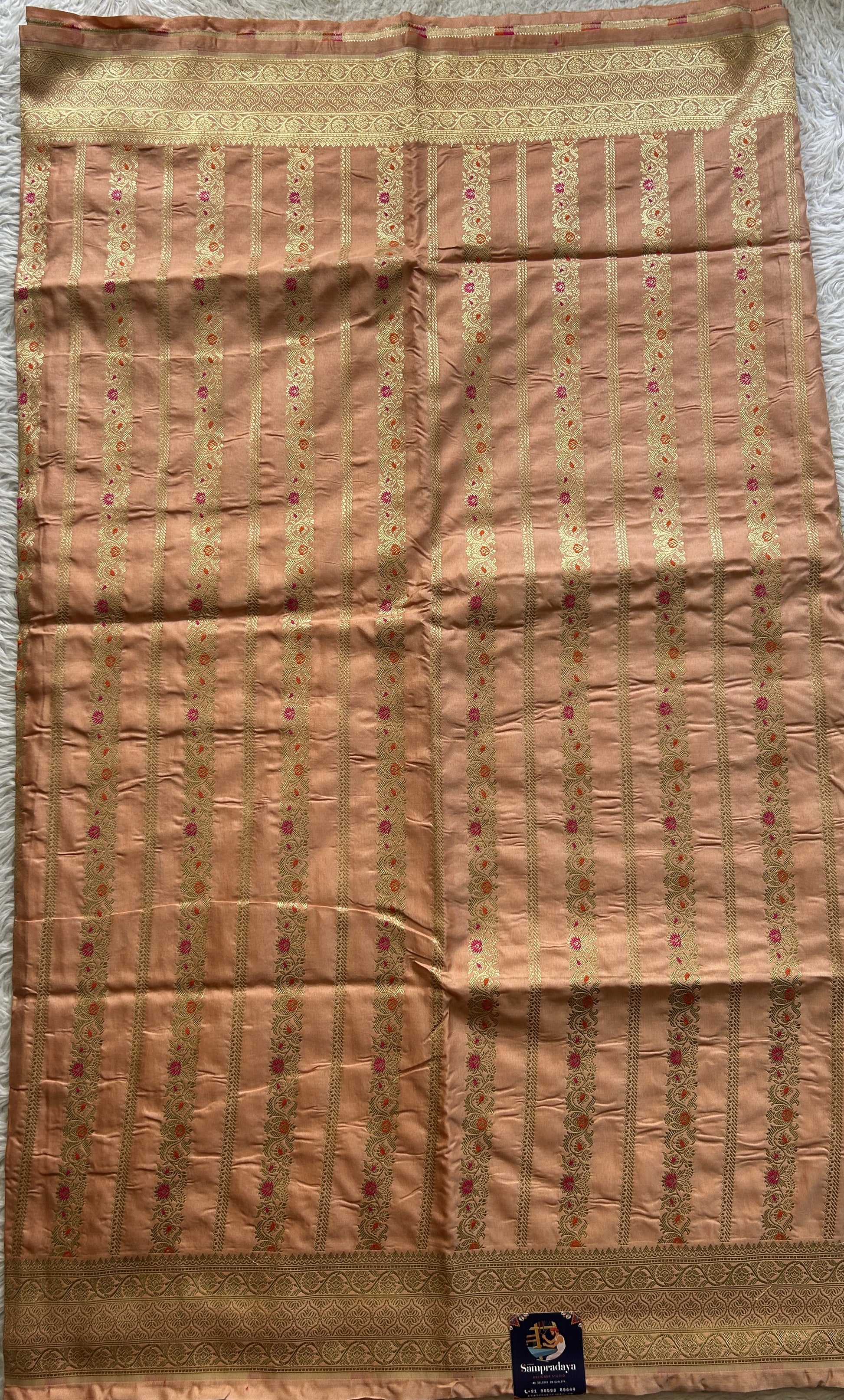 Chiniya Silk Saree Light Peach Colored Elegantly Paired with a Zari Border. - Sampradaya Designer Studio